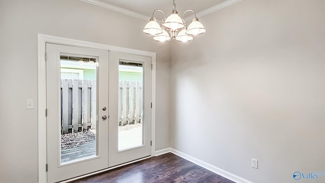 entryway with ornamental molding, french doors, baseboards, and dark wood-style flooring