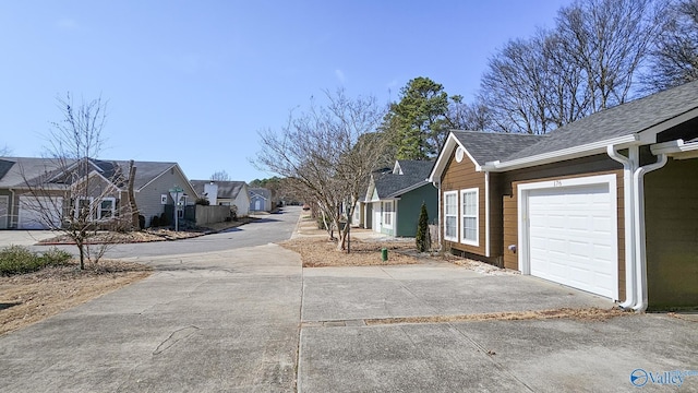 view of road with a residential view