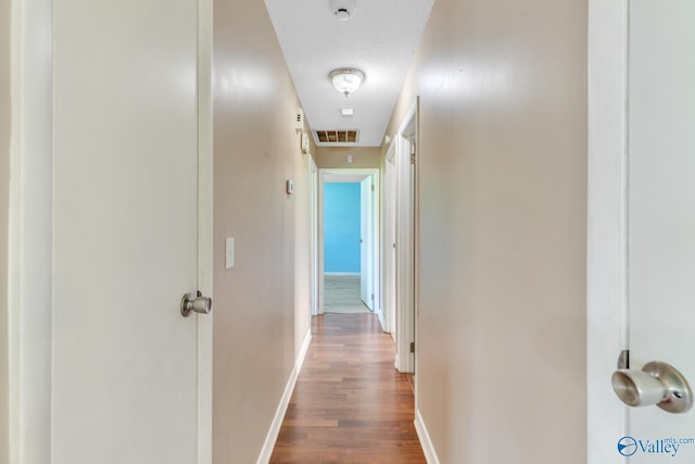 3104 Sandlin Rd SW, Decatur, AL 35603 - hallway featuring wood finished floors and baseboards