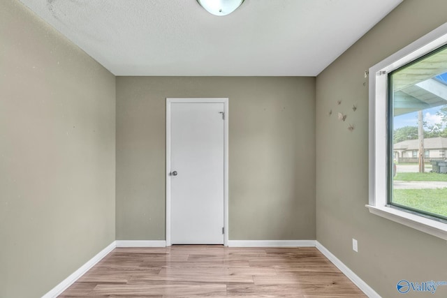 3104 Sandlin Rd SW, Decatur, AL 35603 - spare room with light wood-style flooring and baseboards