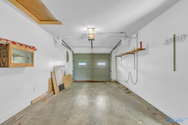 3104 Sandlin Rd SW, Decatur, AL 35603 - garage with baseboards and a garage door opener