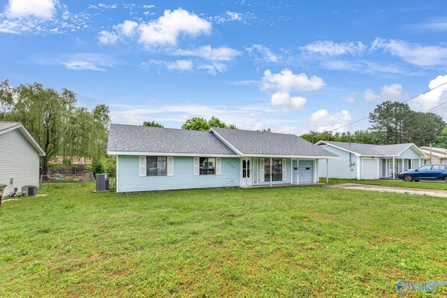 3104 Sandlin Rd SW, Decatur, AL 35603 - single story home with driveway, a front yard, central air condition unit, and a shingled roof