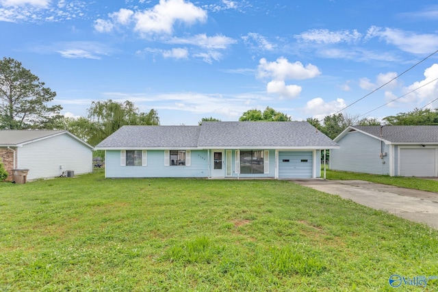 3104 Sandlin Rd SW, Decatur, AL 35603 - ranch-style home featuring an attached garage, concrete driveway, a front lawn, and cooling unit