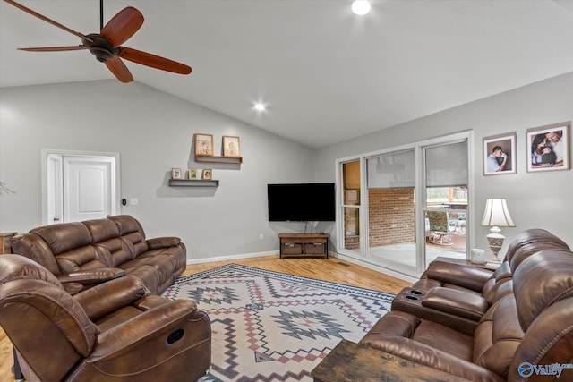 living room with light wood-type flooring, lofted ceiling, and ceiling fan