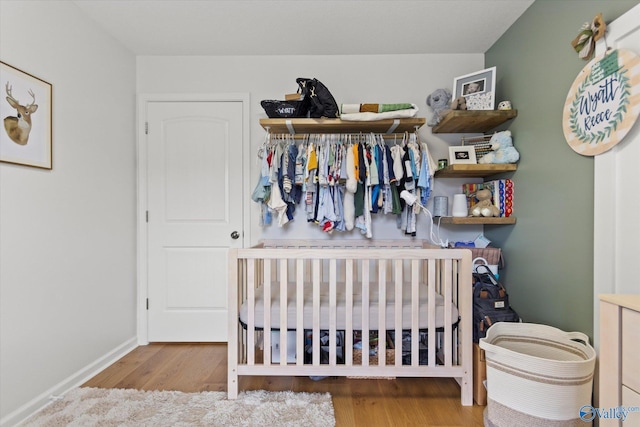 bedroom featuring light wood-type flooring