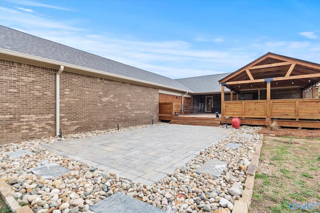 view of patio / terrace featuring a wooden deck