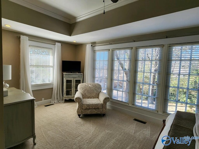 living area with light carpet and crown molding