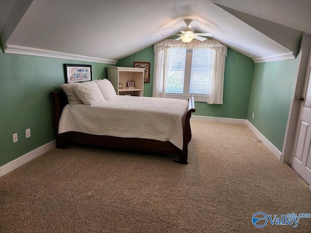 bedroom with lofted ceiling, carpet floors, and ceiling fan