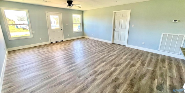 interior space featuring ceiling fan and light hardwood / wood-style floors