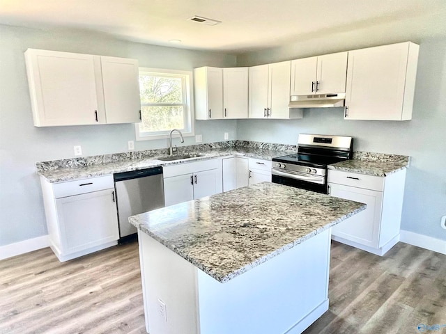 kitchen featuring white cabinetry and stainless steel appliances