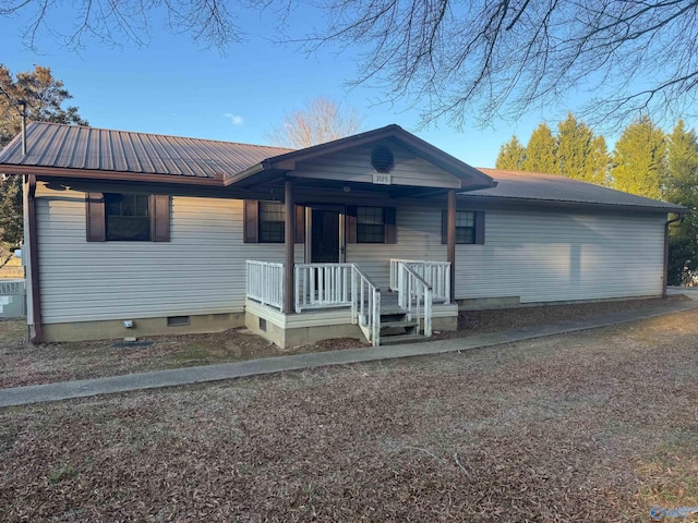 view of front of property with cooling unit