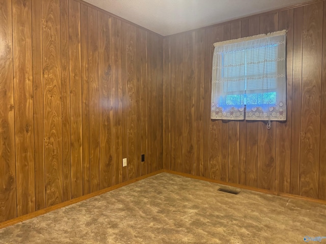 empty room with carpet flooring