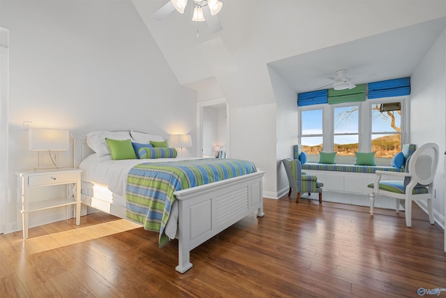 bedroom featuring ceiling fan, high vaulted ceiling, baseboards, and wood finished floors