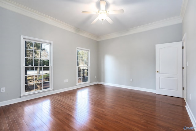 unfurnished room featuring a ceiling fan, crown molding, baseboards, and dark wood-type flooring