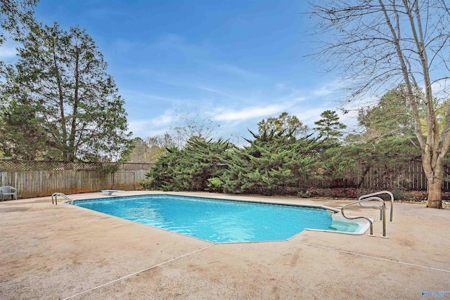 view of pool featuring a patio area, fence, and a fenced in pool