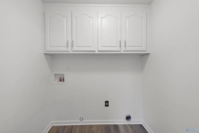 laundry area with washer hookup, cabinets, dark hardwood / wood-style floors, and hookup for an electric dryer