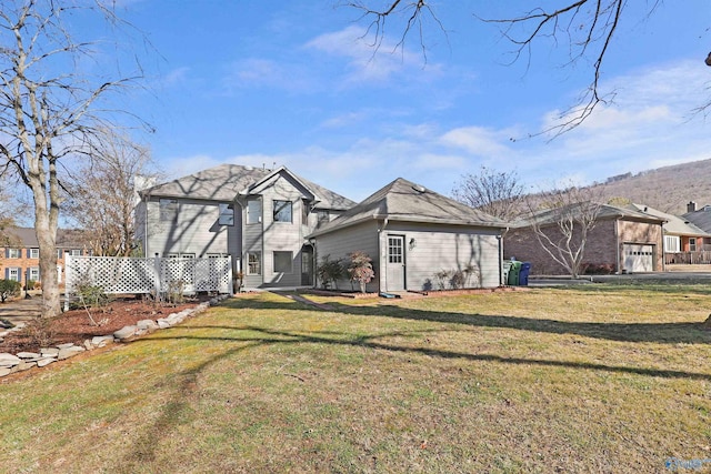 view of front of home with a front yard