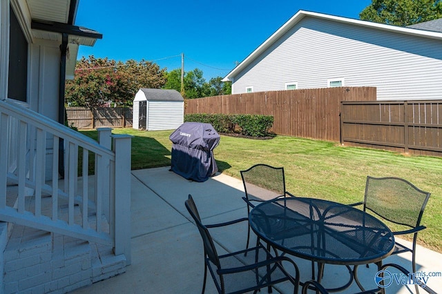 view of patio with a storage shed