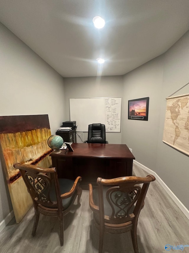 173 N Seneca Dr, Trinity, AL 35673 - office area with wood finished floors and baseboards