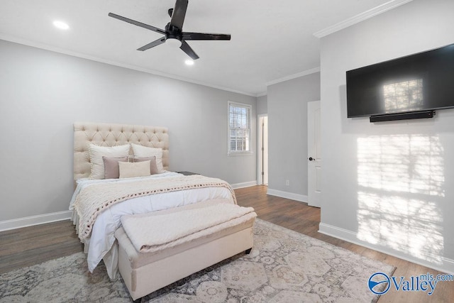 bedroom featuring ceiling fan, hardwood / wood-style floors, and ornamental molding