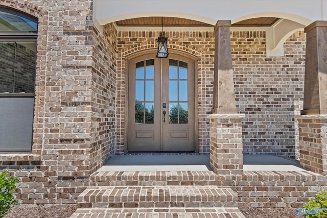 22692 Gunner Cir, Athens, AL 35613 - doorway to property featuring french doors and brick siding