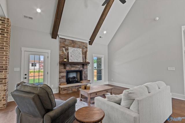 22692 Gunner Cir, Athens, AL 35613 - living area featuring a stone fireplace, high vaulted ceiling, beamed ceiling, baseboards, and ceiling fan