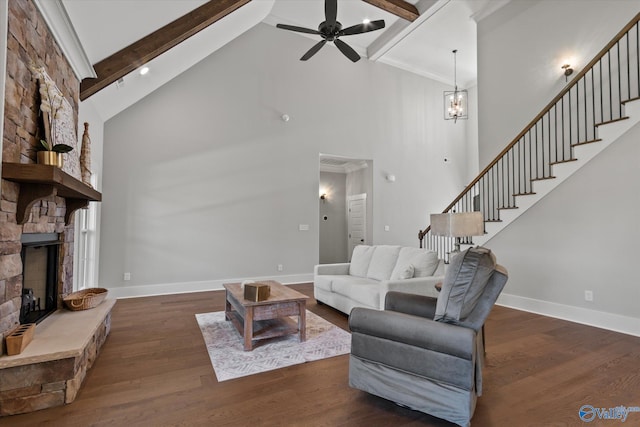22692 Gunner Cir, Athens, AL 35613 - living room with high vaulted ceiling, stairway, beam ceiling, a stone fireplace, and wood finished floors