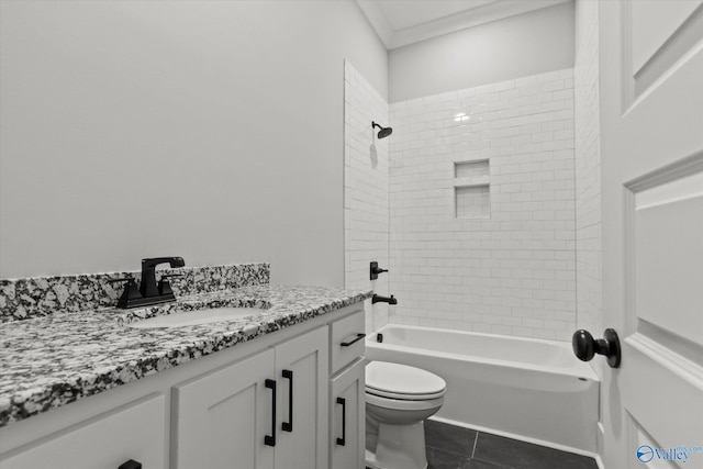 22692 Gunner Cir, Athens, AL 35613 - full bathroom featuring toilet, vanity,  shower combination, ornamental molding, and tile patterned flooring