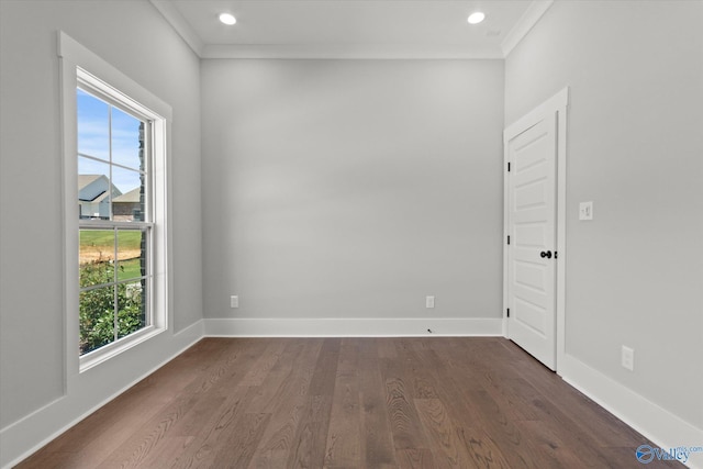 22692 Gunner Cir, Athens, AL 35613 - spare room featuring plenty of natural light, dark wood-style flooring, crown molding, baseboards, and recessed lighting
