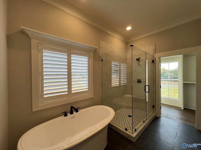 22692 Gunner Cir, Athens, AL 35613 - bathroom featuring a soaking tub, a shower stall, ornamental molding, and recessed lighting