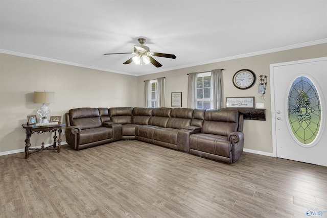 living room with ceiling fan, ornamental molding, and hardwood / wood-style floors