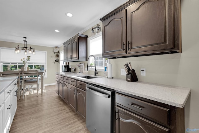 kitchen with dishwasher, light wood-type flooring, sink, white cabinetry, and dark brown cabinetry