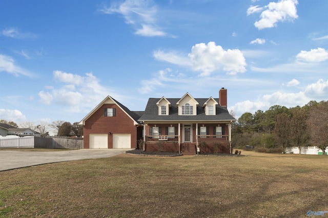 cape cod home with covered porch and a front yard