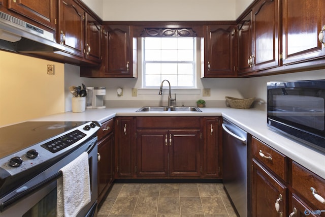 kitchen with ventilation hood, sink, and appliances with stainless steel finishes