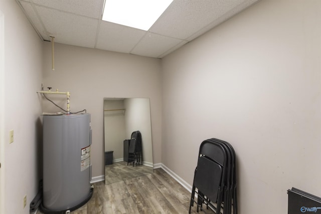 utility room with water heater