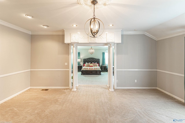 interior space with ornate columns, ornamental molding, and lofted ceiling