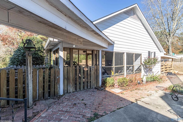 property entrance featuring a patio