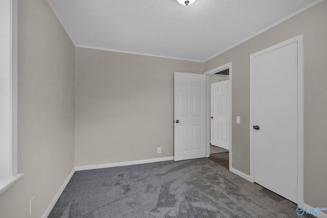 2221 Old Union Rd, Grant, AL 35747 - unfurnished bedroom featuring carpet, baseboards, a textured ceiling, and crown molding