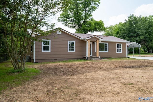 2221 Old Union Rd, Grant, AL 35747 - ranch-style house with crawl space, metal roof, driveway, and a carport