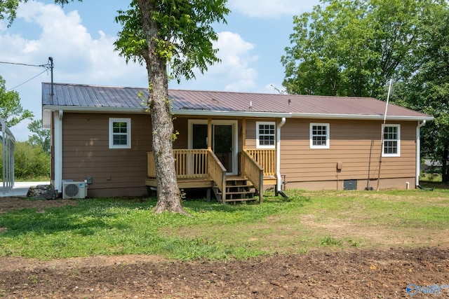2221 Old Union Rd, Grant, AL 35747 - rear view of house with a yard, crawl space, a cooling unit, and metal roof