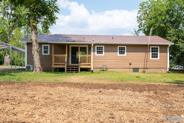 2221 Old Union Rd, Grant, AL 35747 - back of property featuring a carport, metal roof, crawl space, and a cooling unit