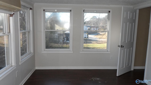 unfurnished room featuring dark hardwood / wood-style floors and a wall mounted AC