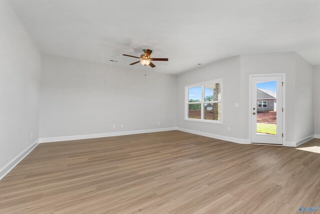 bathroom featuring vanity, hardwood / wood-style flooring, toilet, and a shower with shower door