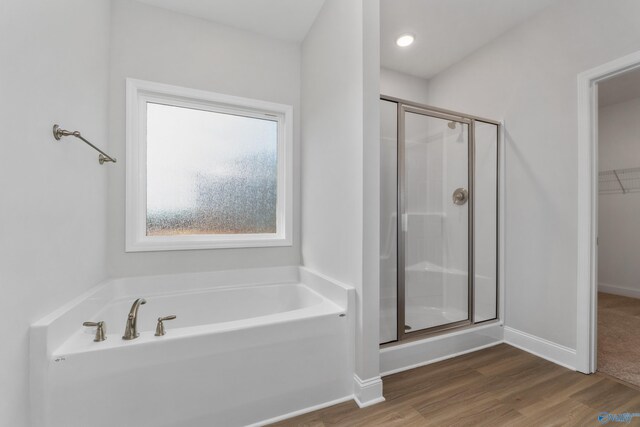 unfurnished bedroom with light colored carpet and a closet