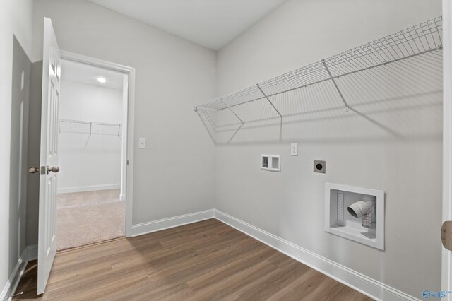 bathroom with vanity, wood-type flooring, and toilet