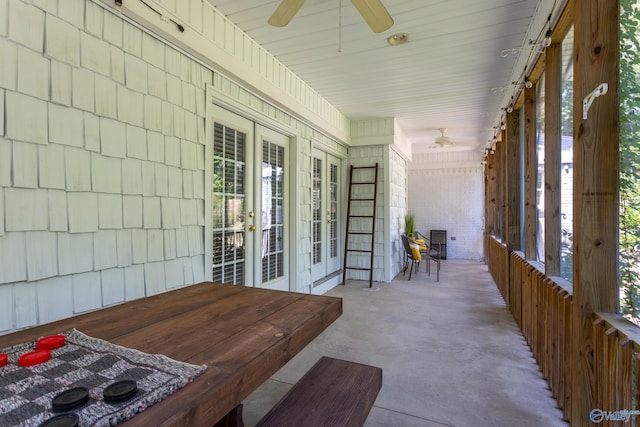 view of patio / terrace featuring ceiling fan and french doors