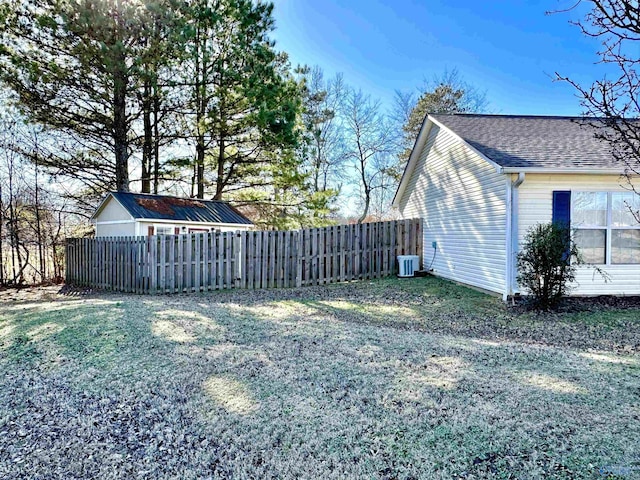 view of yard featuring central AC unit