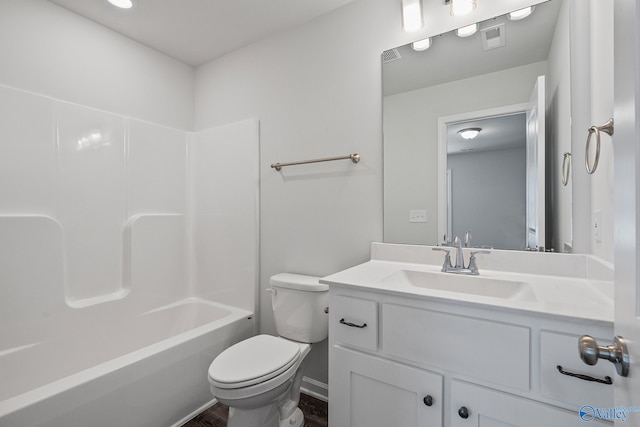 full bathroom featuring vanity,  shower combination, and toilet