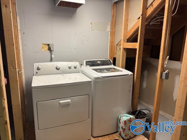 laundry area with laundry area and independent washer and dryer