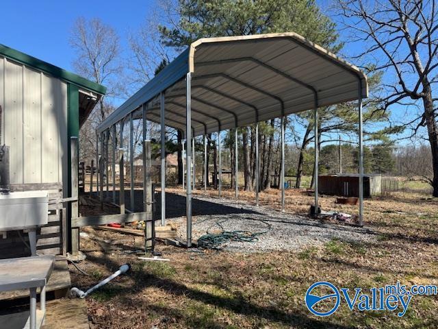 exterior space featuring a detached carport